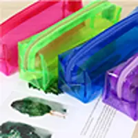 Colorful candy transparent PVC zipper pencil bags in pink, green, blue, and purple